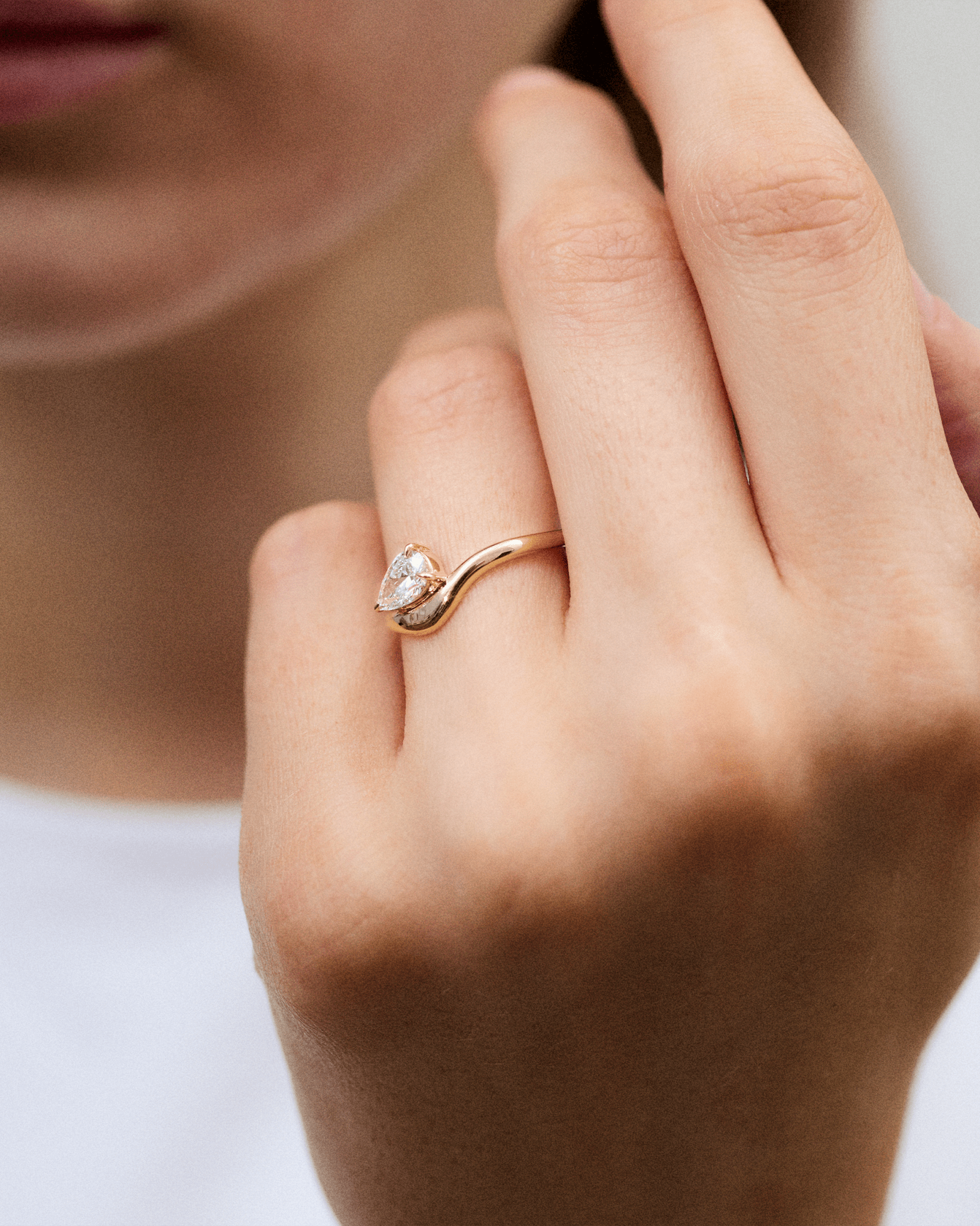 Curved Pear Diamond Ring